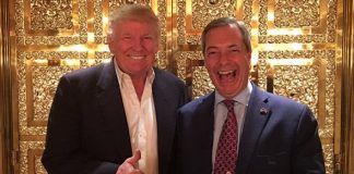 Nigel Farage and Liberace Share Caravan In Fishguard Donald Trump and Nigel Farage in a gold lift.